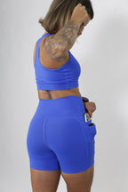 Shorts Azul Simbolo Mulher Maravilha